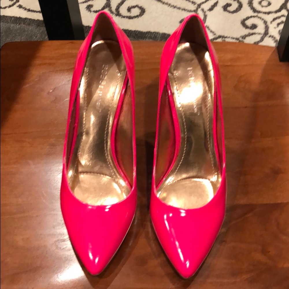 Hot pink high heels.